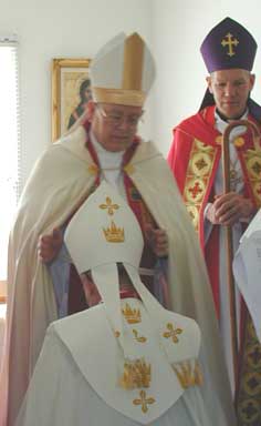 Investiture with mitre and cope